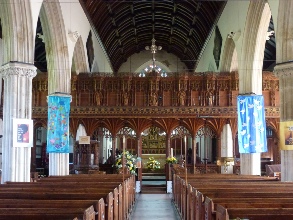 The main isle of All Saints Church in Kenton.