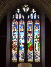 A stained glass windown in All Saints, Kenton. 